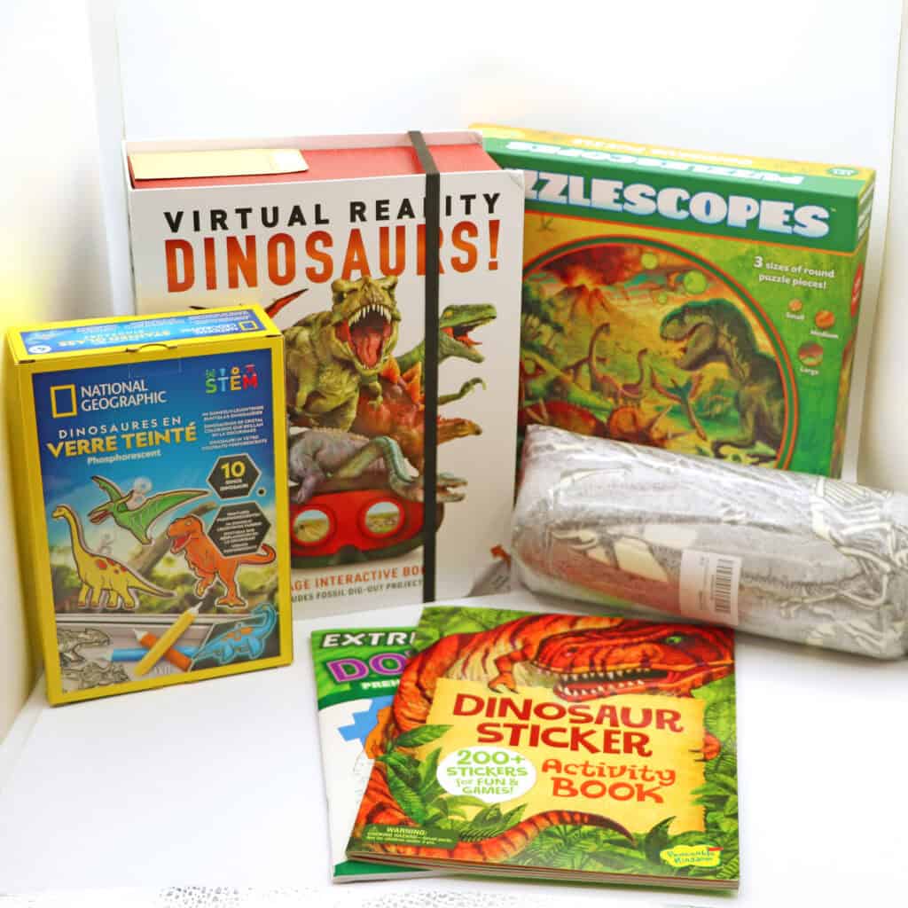 A series of dinosaur puzzles and books
